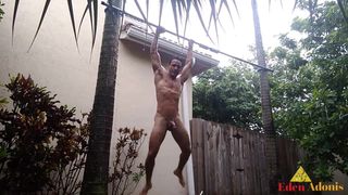 EDENADONIS Hot Guy Doing Pull-ups Naked in the Rain