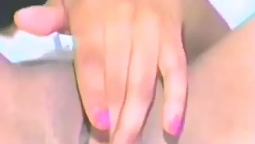An Ebony Babe Fucks Herself with Lots of Dildos