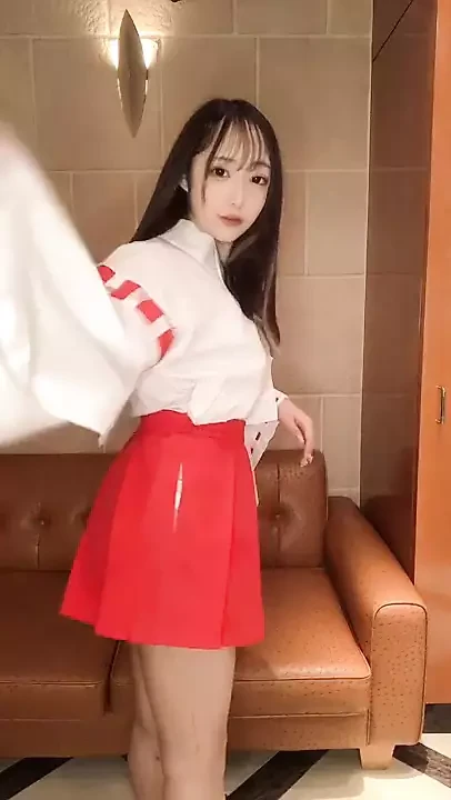 Changing live into a miko (shrine maiden) costume
