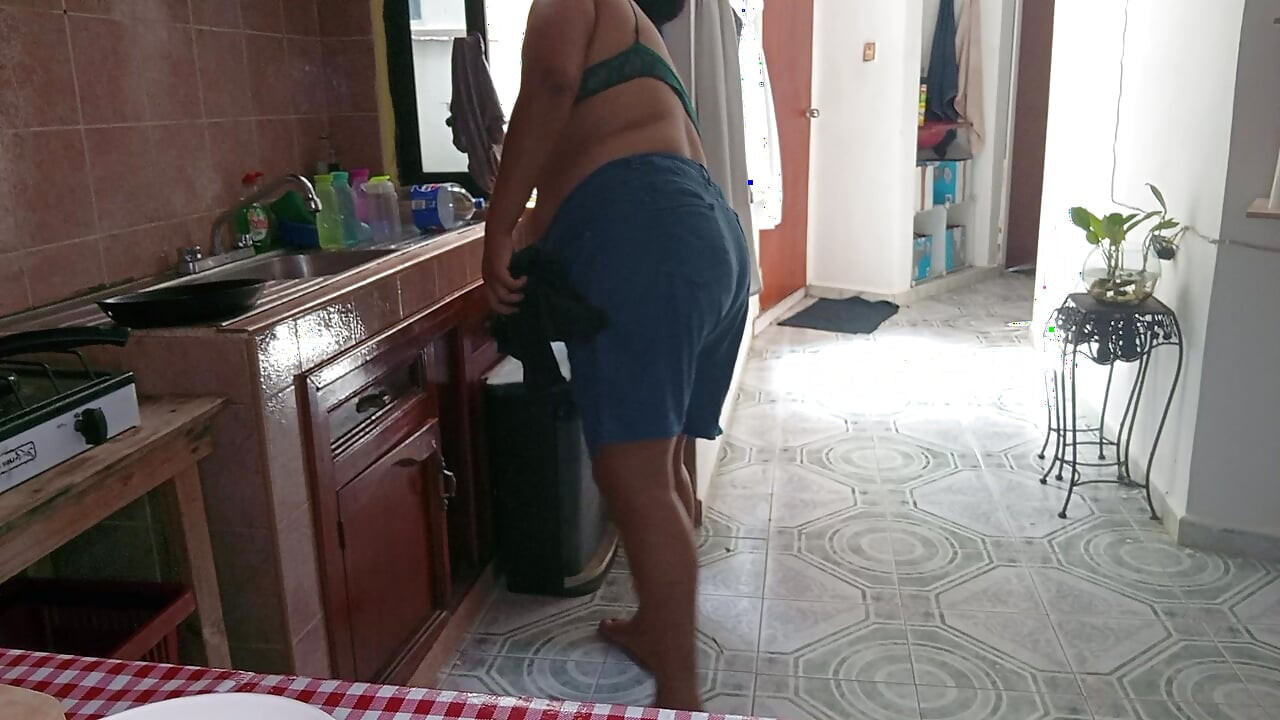 Mom in the kitchen in bralett