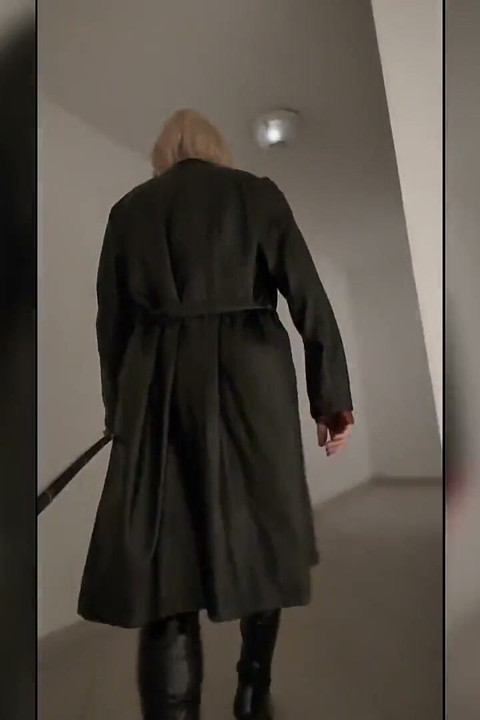 Walk in Parking House, Blonde in Overknee Boots, Red Pvc Dress and Long Leather Coat