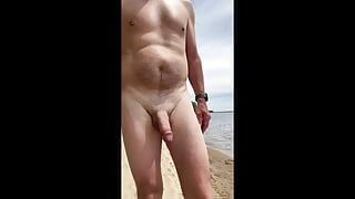 Naked beach walk with people coming