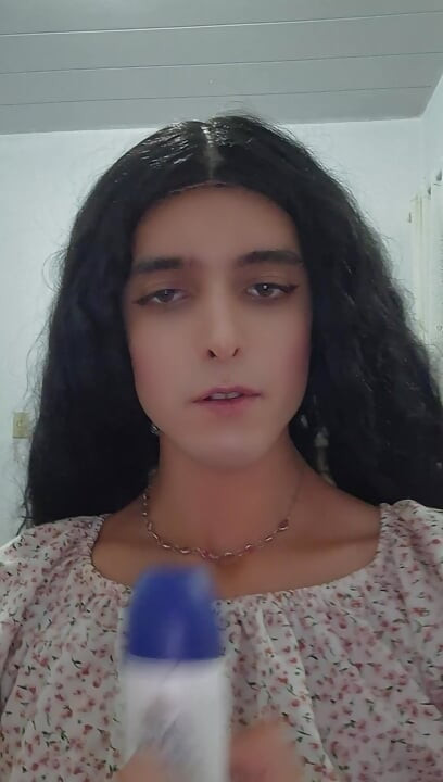 Petite trans girl sucks on deodorant