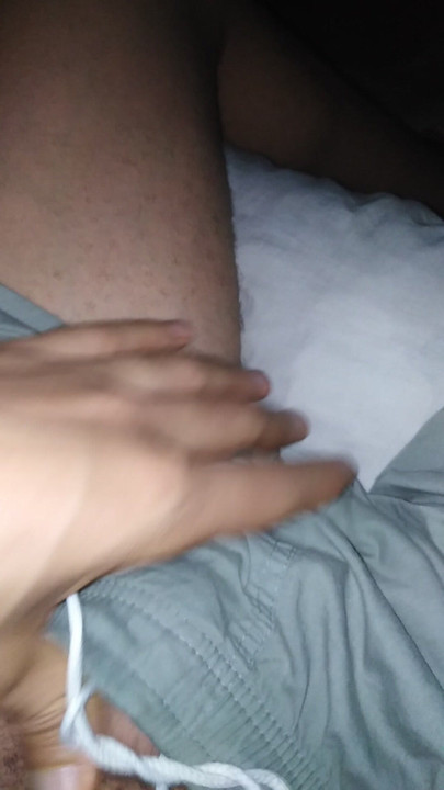 Masturbating