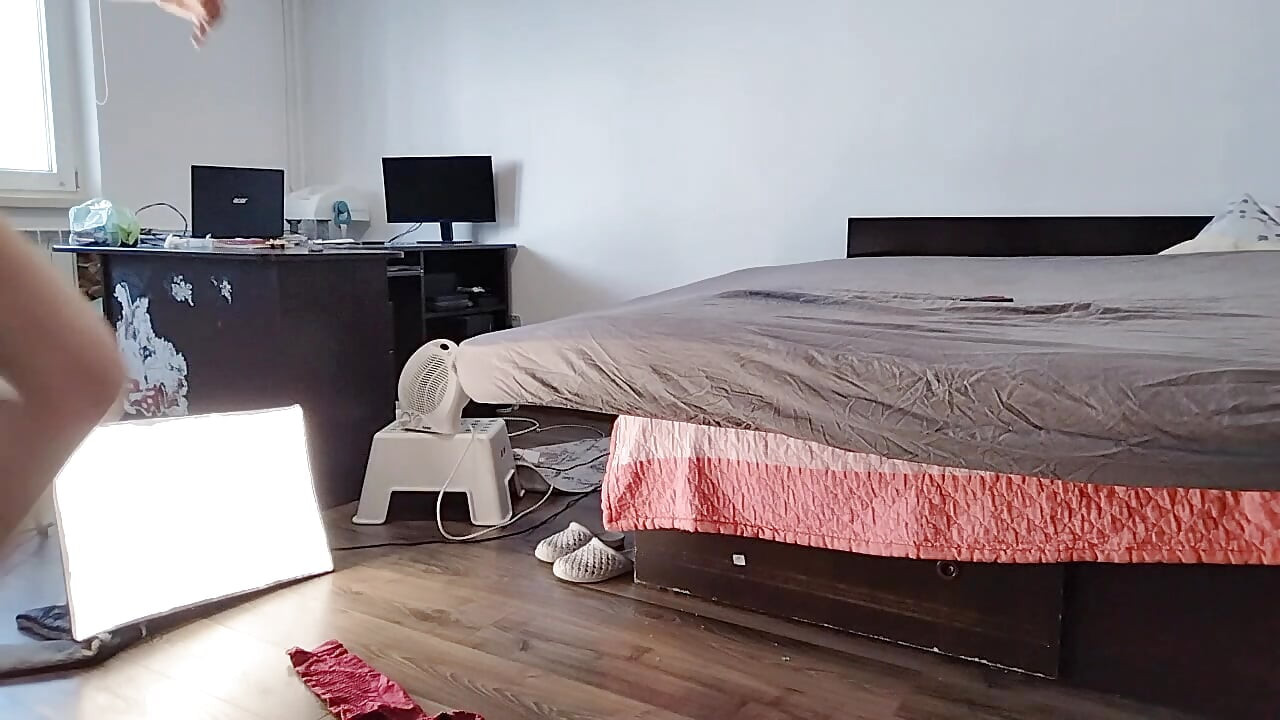 Sexy Latina Having Fun Trying on Clothes and Cutting Them.