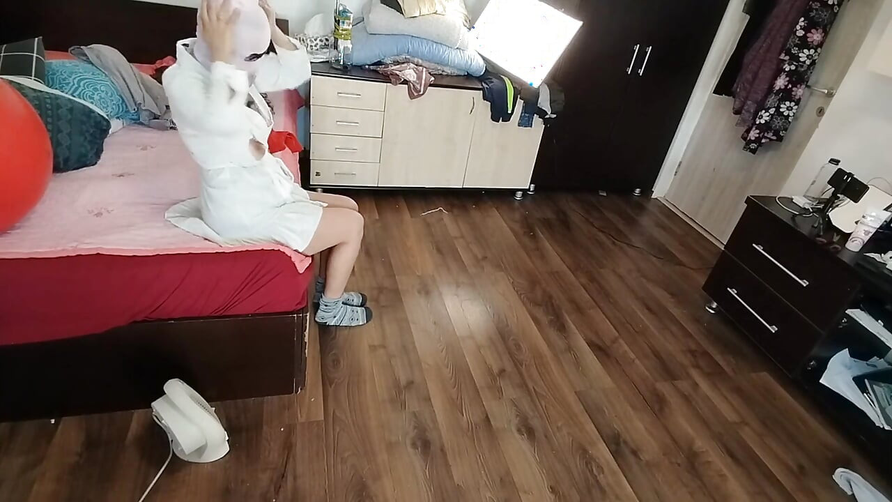 Amateur Woman Has Fun Trying on Clothes and Cutting Them