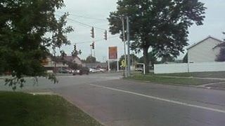 1992 gillig bus going through city in evansville,indiana