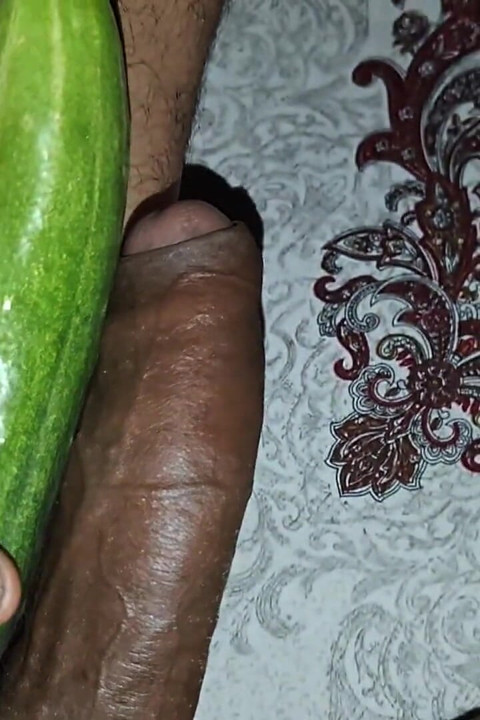 A Long, Thick Cucumber in a Hot Desi Bhabhi's Hot Pussy