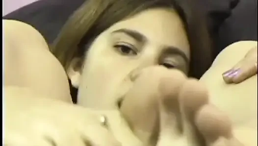 Wendy James sucks on a dildo then fucks her pussy hard with it