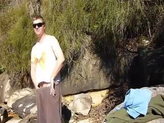 a guy masterbates at the beach