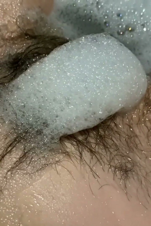 Hairy bush underwater in the bathtub