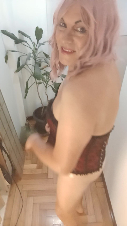 Sissy puts on her corset