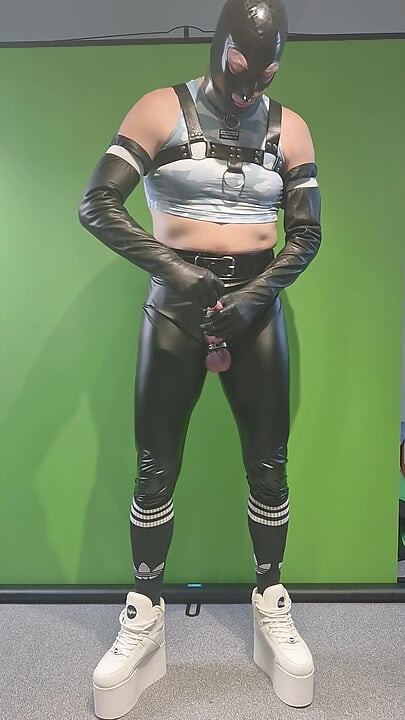 Rave outfit, Buffalo tower shoes, harness, leggings, latex gloves and mask. Inserting butt plug using precum