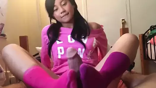 Cute asian girl footjob in pink socks