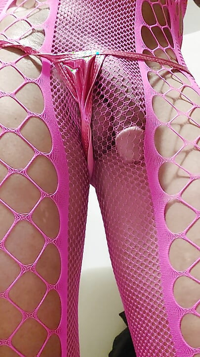 Milah shows off her pink fishnet tail