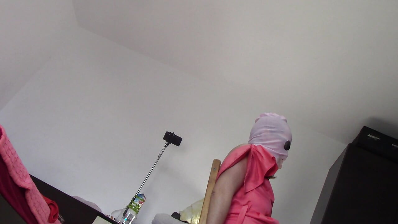 Amateur wife dancing naked at home. Amateur woman has fun trying on clothes and cutting them.