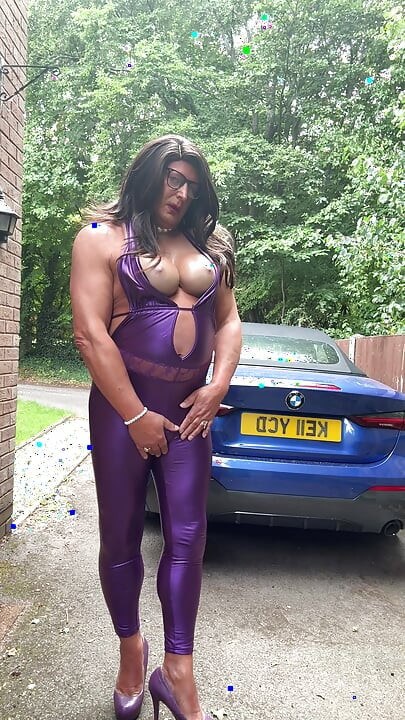 Sexy Crossdresser kellycd2022 in purple pvc catsuit and heels