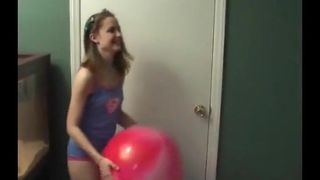 Kitty blowing bubbles in her miniskirt