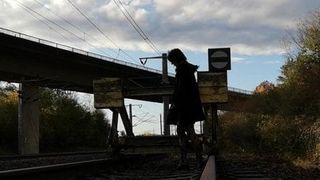 Flashing and masturbating at train track