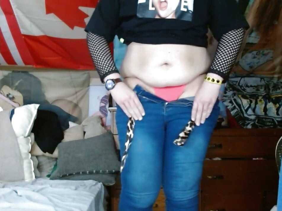 fat sissy with tits wearing and stripping out them tight jeans