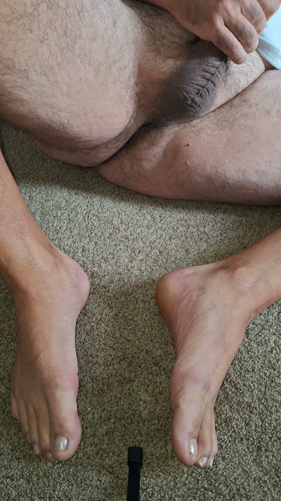 Massaging my balls and playing with my cock barefoot
