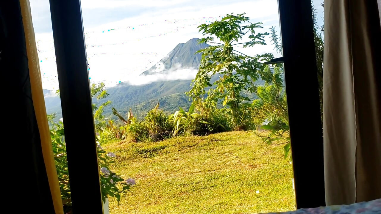 View of the ARENAL VOLCANO while they masturbate me
