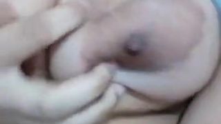 Busty girl fingering pussy