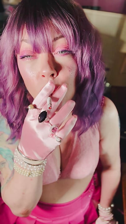 A Cute Tina Snua Tip To Tails 2 Cigarettes With Lots Of Smoke Rings In Satin Gloves & Jewellery