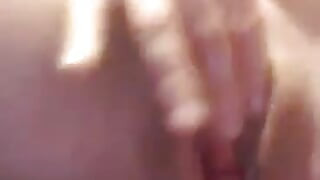 Masturbating