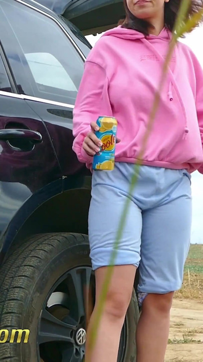 Wetting Her Jeans Outdoor - Desperate Hipster Girl Trying Hard to Pee - Pee Next to the Wheel of the Car