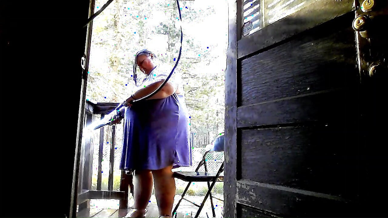 Showering in the water hose. pt 2