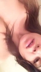 Horny young slut licks her Cum