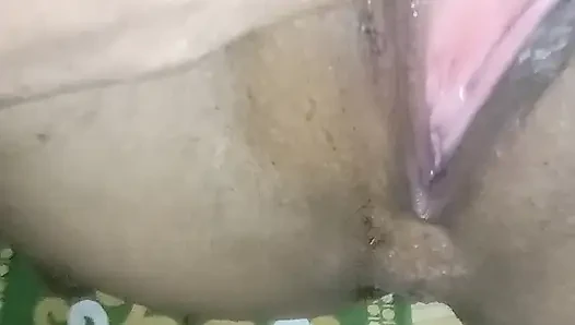 Sitting next to her husband while she was in the shower.