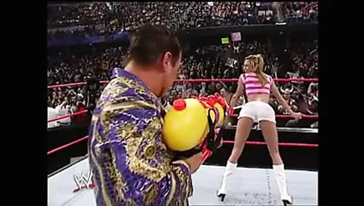 WWE - Stacy Keibler in white shorts sprayed by super soaker