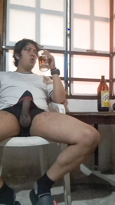 Drinking beer.