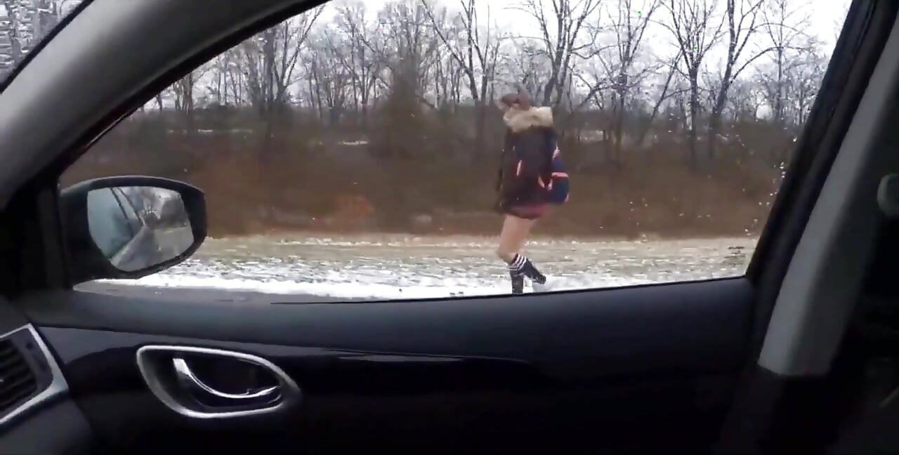 Teen Girl in Plaid Skirt Gets a Ride to School From a Stranger on a Snowy Day