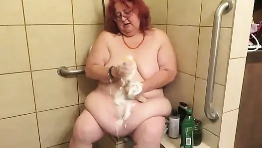 Step mom cleaning bathroom thinks of her step son watching