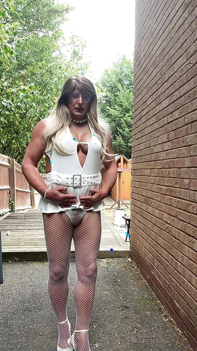Sexy Crossdresser kellycd2022 in sexy white mini dress and fishnet pantyhose and heels