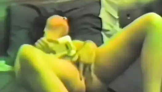 A horny brunette jerking off with two dildos