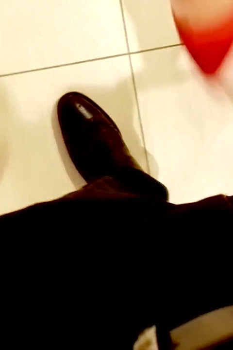 Shoeplay and Modeling in Stunning Red Pumps in a Shoe Store