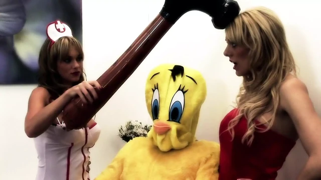 Sexy chicks give head to this cartoon man in uniform