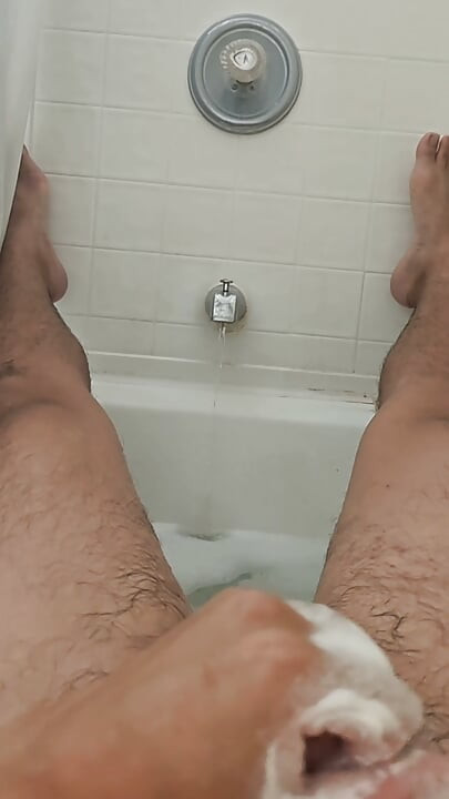 Cleaning Up in the Tub Bathing Solo and Rinsing Off