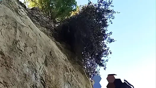 On a beach sex at the risk of being seen