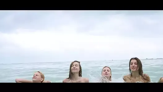 CHASE THE SUN - Oiled nymphs at the beach