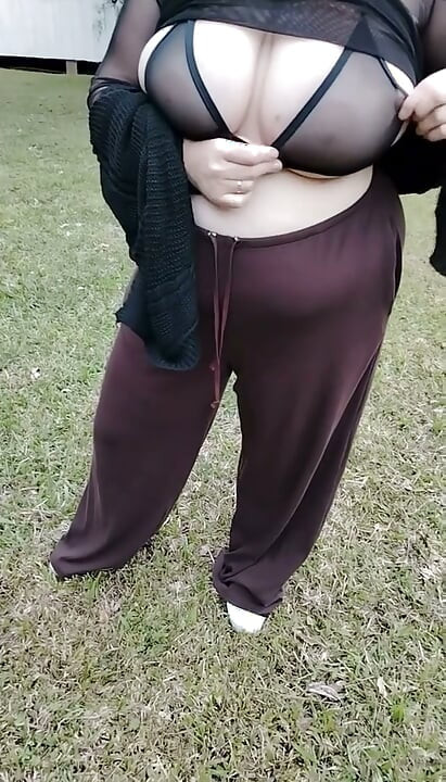 My stepmother walking in a transparent T-shirt.
