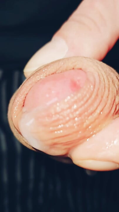 Horny uncut guy playing with long foreskin again precum and cum