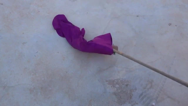 sweeping concrete floor with Pink Fuschia 4 dress