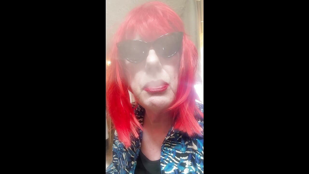MRS. ROMAN DESTROYING A MARLBORO 100 MENTHOL CLOSE UP - WITH DANGLING AND NOSTRIL EXHALES