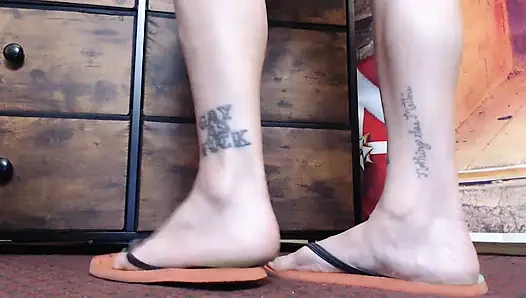 Flipflop shoeplay standing closeup Milf