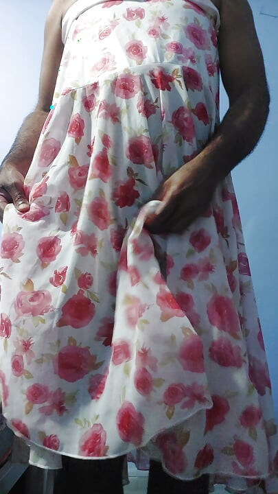 Shemale masterbate and cum wearing a silk seethrough fleard chiffon floral skirt